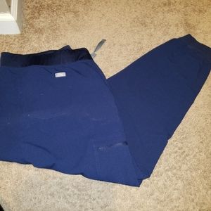 FIGS jogger style navy scrub pants.